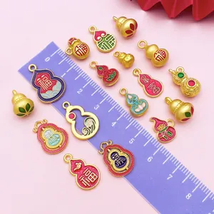 Detailed view of colorful Chinese gourd pendants with a ruler showing the scale in cm.