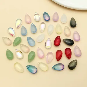 Close-up of multicolored iridescent teardrop glass beads for DIY hairpins and jewelry making