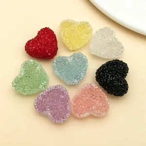 Macro detail of colorful heart-shaped sugar beads for DIY jewelry and accessories