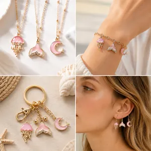 Detailed view of pink ocean-themed enamel charms styled as necklaces, bracelets, and earrings.