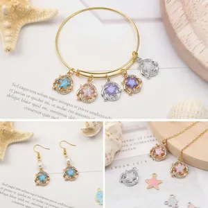 Breloques d'étoiles en nacre irisée avec strass pour la création de bijoux DIY chic