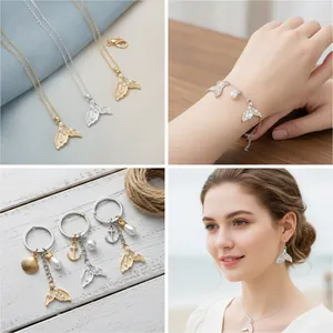 Luxury mermaid tail jewelry set with necklaces, bracelets, and charms decorated with pearls