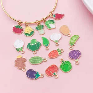 Close-up of colorful enamel vegetable charms for DIY bracelet and necklace making.
