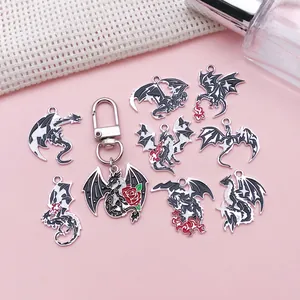 Detailed set of dark gothic dragon charms featuring rose and fire breathing designs
