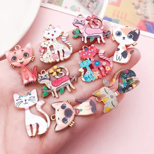 Assorted colorful floral cat enamel charms for DIY jewelry making accessories in hand