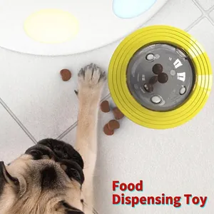 Jouet distributeur de friandises interactif jaune en forme d'OVNI pour chiens