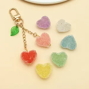 Detail view of colorful sugar-coated acrylic heart charms for DIY crafts and jewelry
