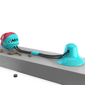 Suction cup dog toy with pet molar ball for teeth cleaning and food dispensing