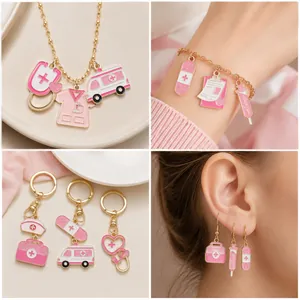 Detail showing pink medical charms as earrings, bracelets, and necklaces for nursing gifts