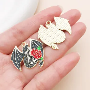 Macro detail of gothic dragon and rose enamel pendant for DIY jewelry making accessories