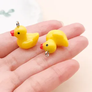 Miniatuur geel hars eend bedeltjes voor DIY telefoonhoesjes en sleutelhanger accessoires