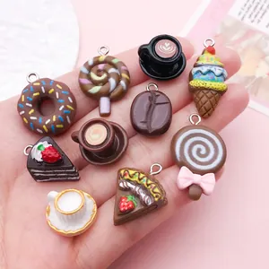 Detailed view of chocolate-themed resin charms like donuts and coffee for DIY jewelry