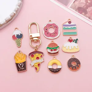 Selection of cute food-themed enamel pendants like donuts and pizza for DIY jewelry