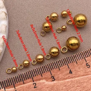 Detaillierte Größenführung für goldene Edelstahlperlen mit 1,8 mm und 2,3 mm Loch.