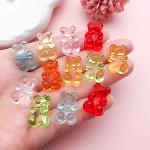 Detailed view of colorful translucent acrylic gummy bear charms for DIY crafts and phone cases