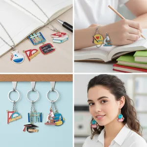 Detailed view of back-to-school enamel charms used in necklaces and bracelets