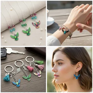 Detailed view of colorful printed hummingbird charms on necklace, bracelet, and earrings