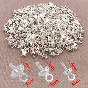 Detailansicht silberner Halbloch-Schmuckstifte mit präzisen Maßen von 3 mm bis 7 mm