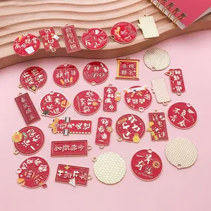 Detailed view of assorted red alloy charms with gold Chinese exam blessing text