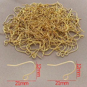 Detail showing 12mm by 21mm dimensions of 18k gold plated earring hook findings.