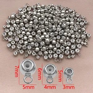 Vista detallada de cuentas plateadas con insertos de silicona de 5 mm, 4 mm y 3 mm.