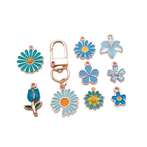 Meerblauw emaille bloem bedels set voor DIY sieraden maken met madeliefje motieven.