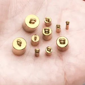 Various sizes of gold stainless steel tassel caps and bell pendants for DIY jewelry making