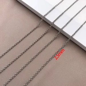 Close-up detail of 2.5mm stainless steel woven link chain necklace.
