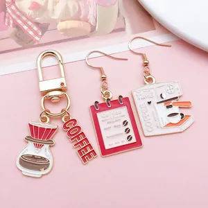 Detailed macro view of coffee themed alloy charms featuring coffee machine and menu