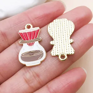 Close-up of alloy enamel coffee dripper charms showing front and textured gold back.