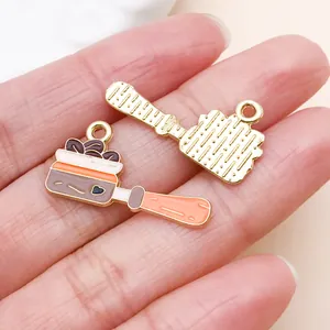 Macro view of coffee themed enamel alloy charms for DIY jewelry accessories and crafts