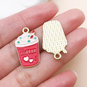 Close-up of pink enamel coffee cup charm and gold textured back for DIY jewelry making