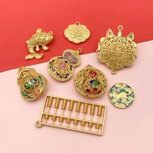 Detailed view of various traditional Chinese gold-style DIY jewelry charms and pendants.