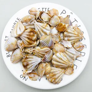 Macro view of acrylic shell charms with natural-looking brown textures for DIY