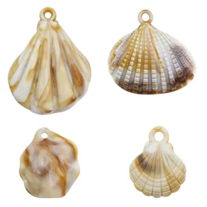 Set of four different marble-patterned acrylic shell pendants for DIY crafts and home decor