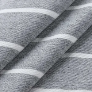 Detailed texture of soft grey and white striped jersey knit fabric for nursing dress