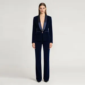 Professional model wearing a navy blue velvet blazer with shawl collar and matching suit pants