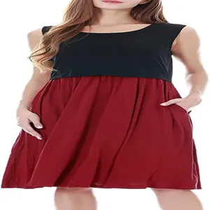 Dettaglio abito premaman senza maniche con top nero e gonna bordeaux con tasche
