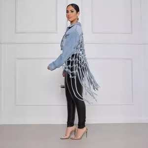 Veste en jean bleu clair tendance pour femme avec motif unique à franges en mesh au dos