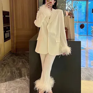 Elegant snow white minimalist blazer suit with ostrich feather cuffs and pants hem