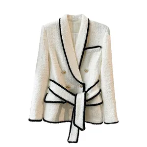 Elegant white tweed blazer featuring black piping trim and a matching waist-tie belt