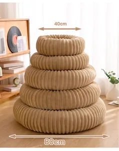 Stack of soft plush round pet beds showing various sizes from 40cm to 80cm diameter