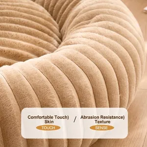 Macro view of a round warm plush pet bed with a ribbed corduroy texture in tan color.