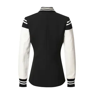 Back view of a slim fit black and white varsity style blazer with striped ribbing.