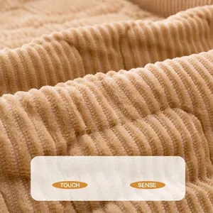 Close-up detail of the soft and durable corduroy texture on a brown pet sofa dog mat