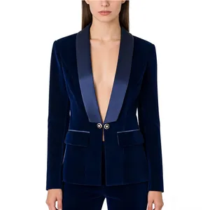 Detailed view of navy blue velvet blazer with satin shawl collar and button