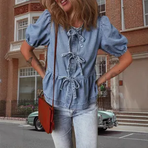 Camicia casual in denim blu con maniche a sbuffo e fiocchi frontali per donna alla moda