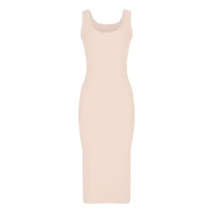 Detailed macro view showing the fine ribbed texture of a pale peach sleeveless midi dress