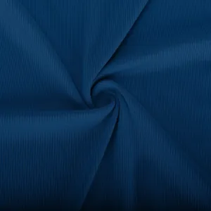 Macro view of blue ribbed knit fabric showing fine texture and soft elasticity