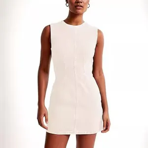 Chic sleeveless white denim mini dress with a round neck and high waist for women
